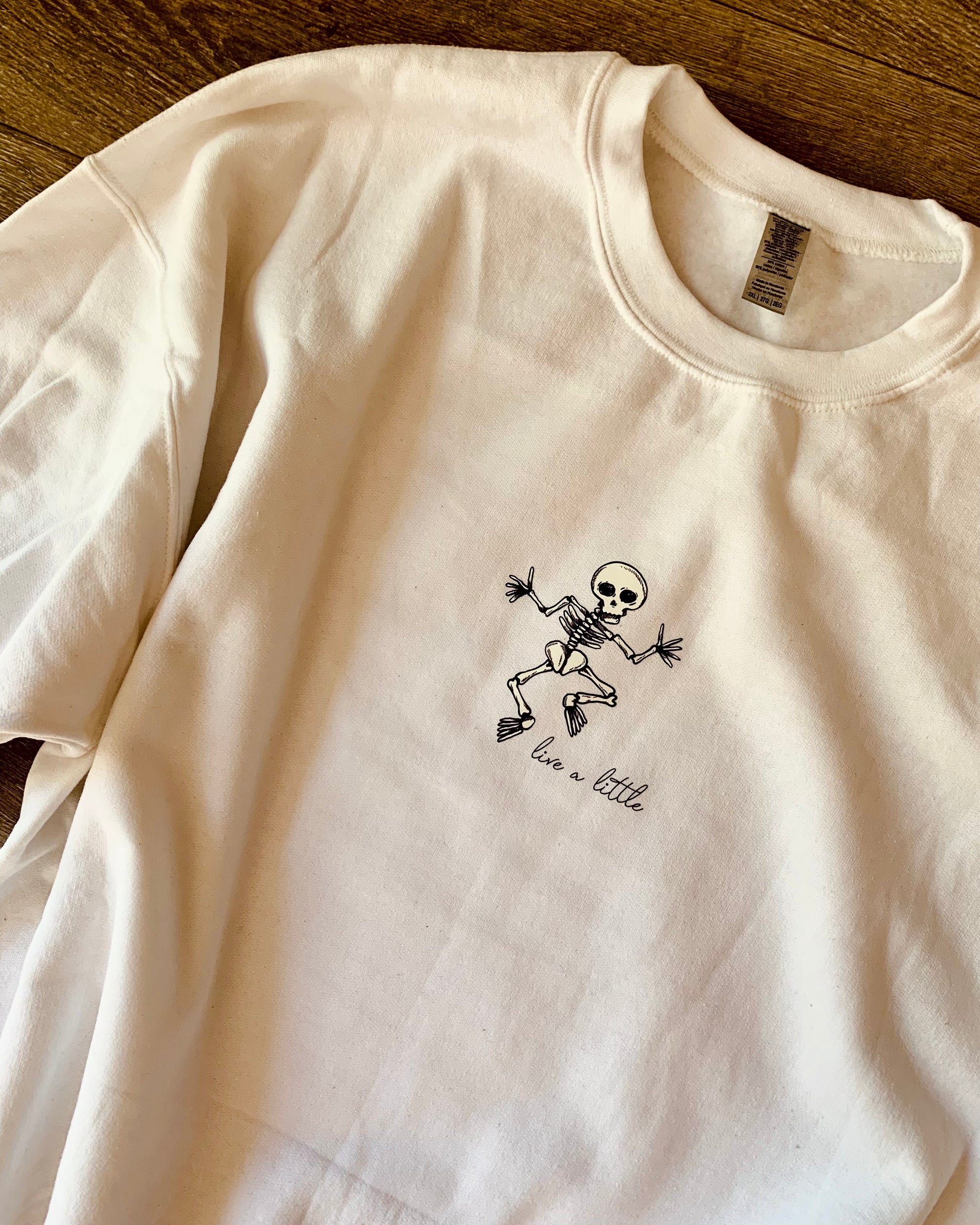 Live A Little Dancing Skeleton Halloween Crewneck